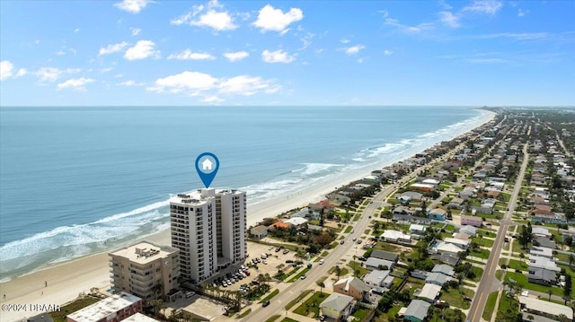 aerial view featuring a beach view and a water view