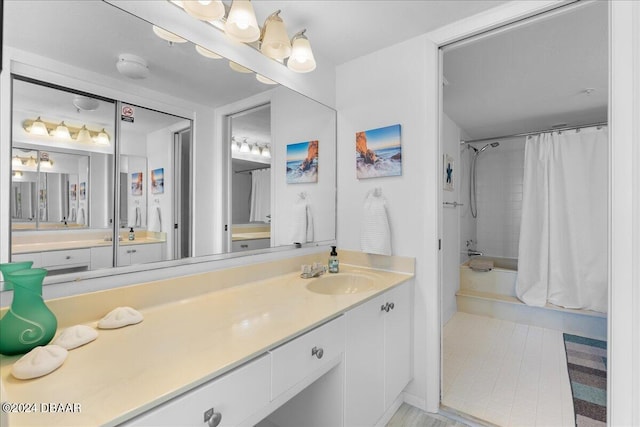 bathroom with vanity and shower / bath combo