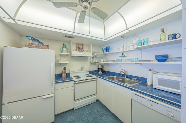 kitchen with ceiling fan, white appliances, and sink