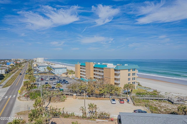 bird's eye view with a view of the beach and a water view