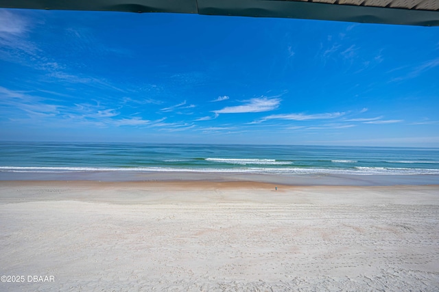 view of water feature with a beach view