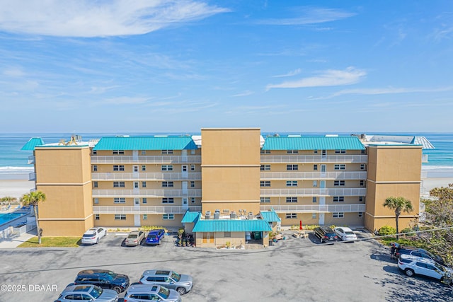 view of property with a water view