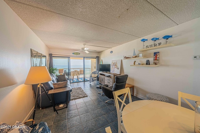 living room with ceiling fan