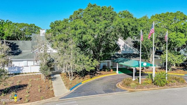 4121 Salina Ln, Ormond Beach, FL 32174 - view of street with curbs and view of wooded area