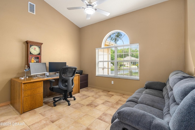office area with baseboards, visible vents, a ceiling fan, and vaulted ceiling