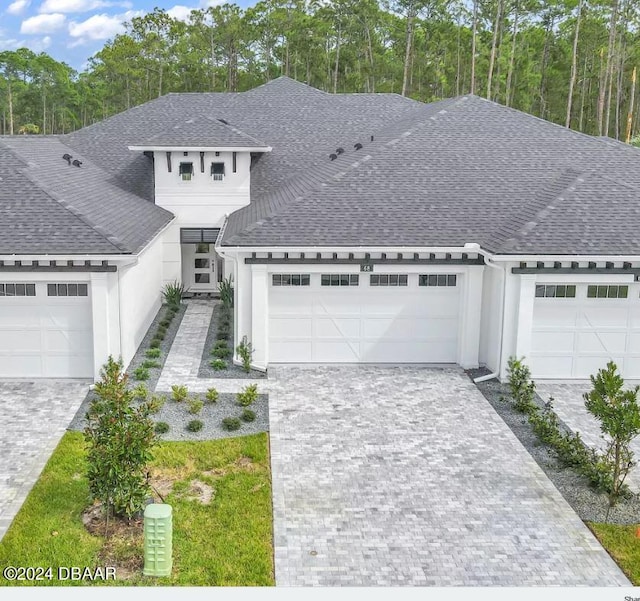 view of front of home with a garage