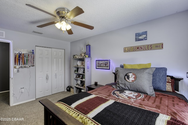61 Levee Ln, Ormond Beach, FL 32174 - bedroom featuring carpet floors, a closet, ceiling fan, and a textured ceiling
