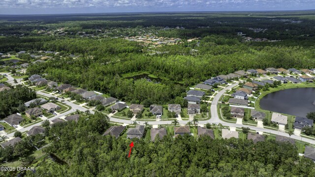 61 Levee Ln, Ormond Beach, FL 32174 - aerial view of property and surrounding area featuring nearby suburban area and a large body of water