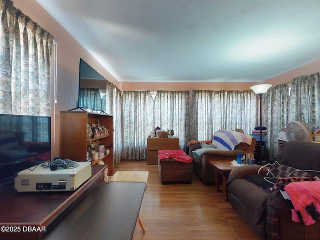 310 Legion Pl, Port Orange, FL 32129 - living room with wood finished floors and a healthy amount of sunlight