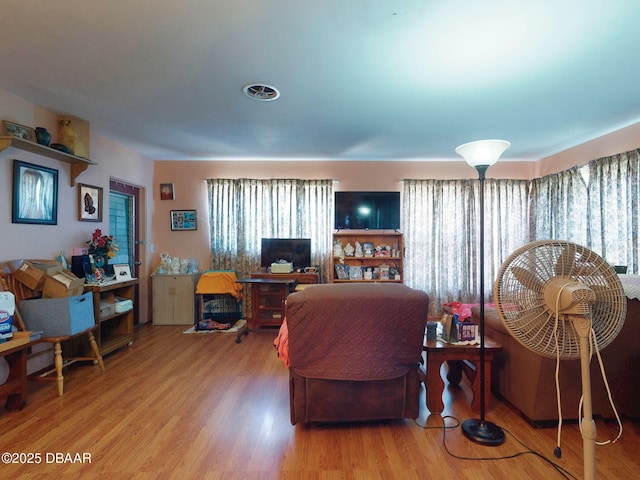 310 Legion Pl, Port Orange, FL 32129 - living room featuring wood finished floors and a wealth of natural light