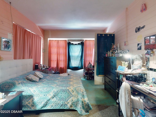 310 Legion Pl, Port Orange, FL 32129 - bedroom with wooden walls and carpet floors