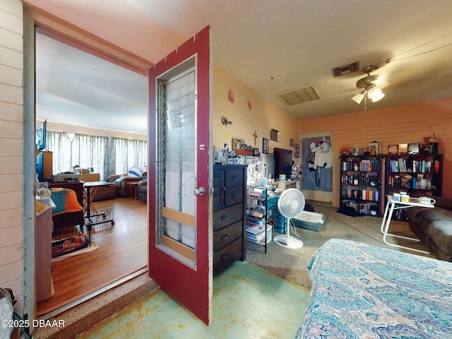 310 Legion Pl, Port Orange, FL 32129 - bedroom featuring wood walls and visible vents