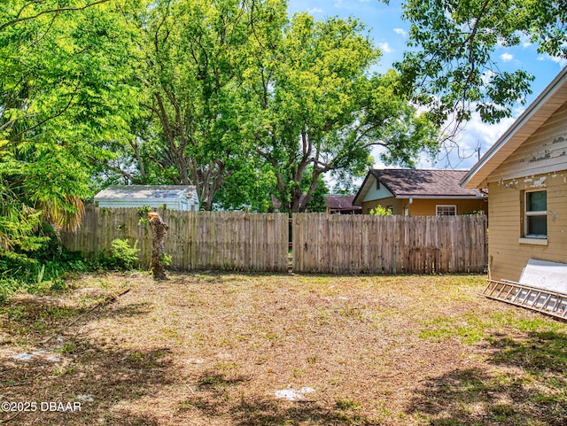 310 Legion Pl, Port Orange, FL 32129 - view of yard with a fenced backyard