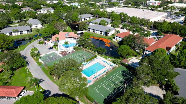 4655 46th Street Ct W Unit 101, Bradenton, FL 34210 - drone / aerial view of a pool and a large body of water