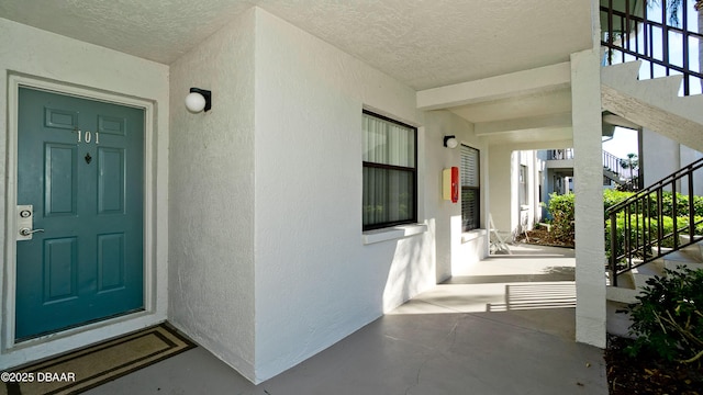 4655 46th Street Ct W Unit 101, Bradenton, FL 34210 - view of exterior entry featuring stucco siding