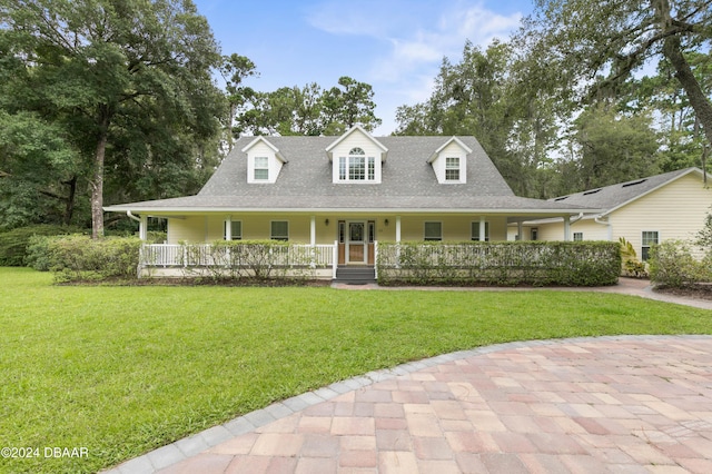 view of front facade with a porch and a front yard