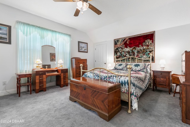 bedroom featuring carpet flooring, ceiling fan, and lofted ceiling