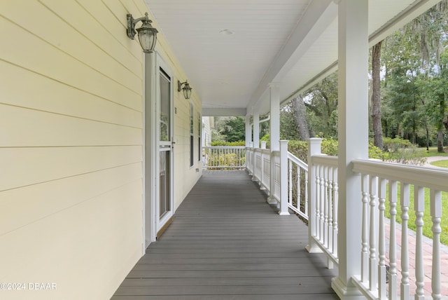 wooden deck featuring covered porch