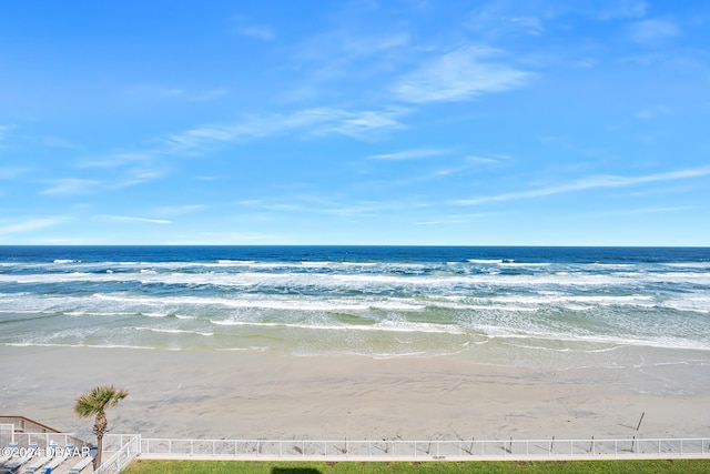 view of water feature with a beach view