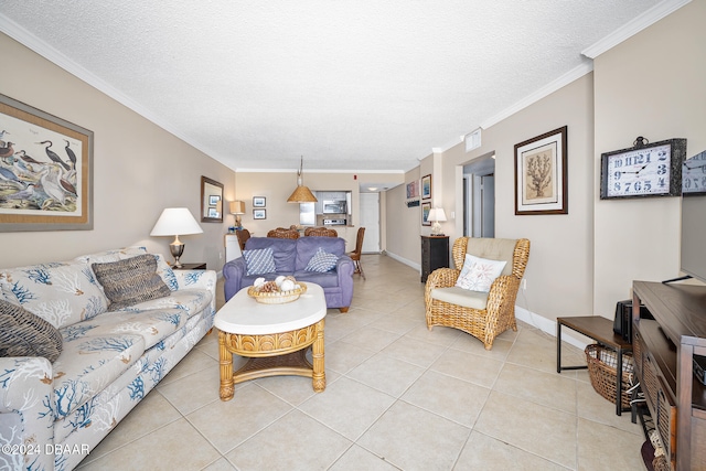 tiled living room featuring a textured ceiling and ornamental molding