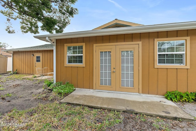 property entrance featuring french doors