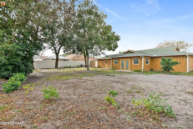 view of yard featuring french doors