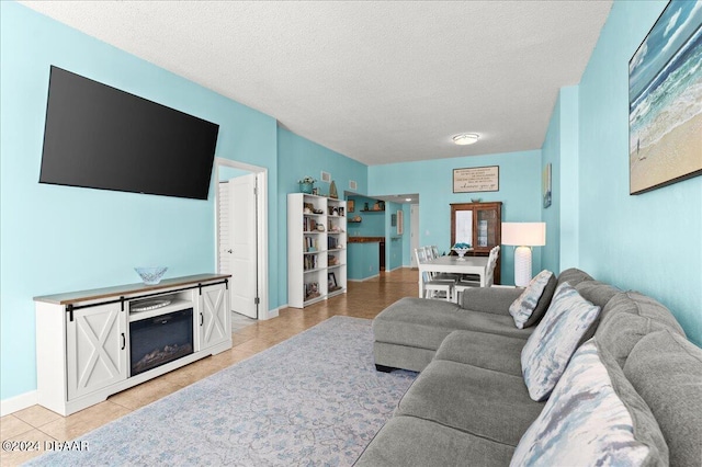 tiled living room with a textured ceiling