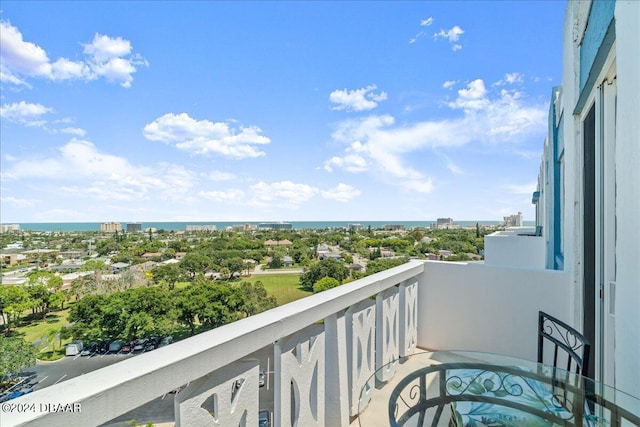 balcony featuring a water view