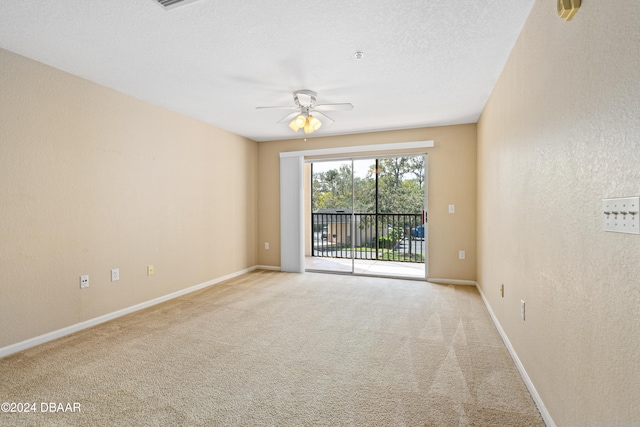 unfurnished room with light carpet and ceiling fan