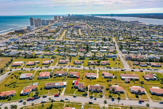 drone / aerial view with a water view