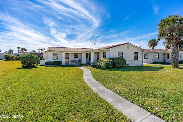 view of front of home with a front yard