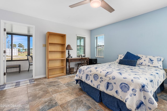 bedroom featuring access to exterior and ceiling fan