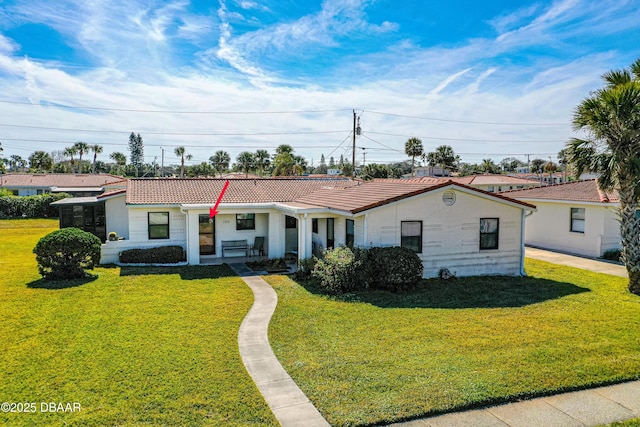 view of front of home with a front lawn