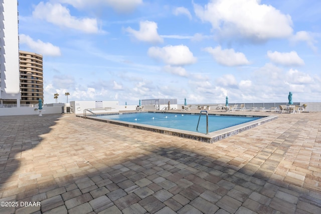 view of pool with a patio area