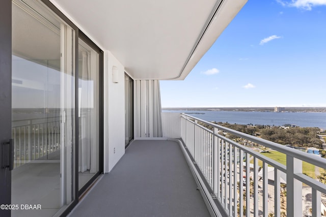 balcony featuring a water view