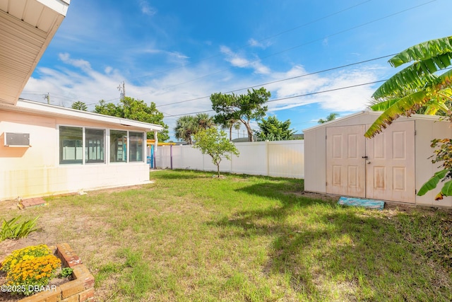 view of yard featuring a storage unit