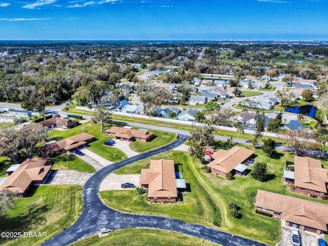 birds eye view of property with a residential view