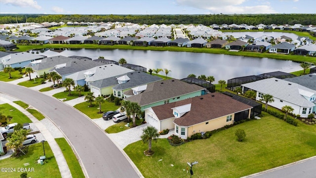 birds eye view of property featuring a water view