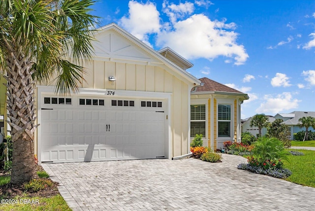 374 Lost Shaker Way, Daytona Beach, FL 32124 - garage with driveway