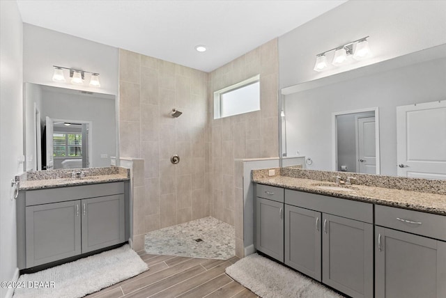 374 Lost Shaker Way, Daytona Beach, FL 32124 - full bathroom featuring walk in shower, wood finish floors, two vanities, healthy amount of natural light, and recessed lighting