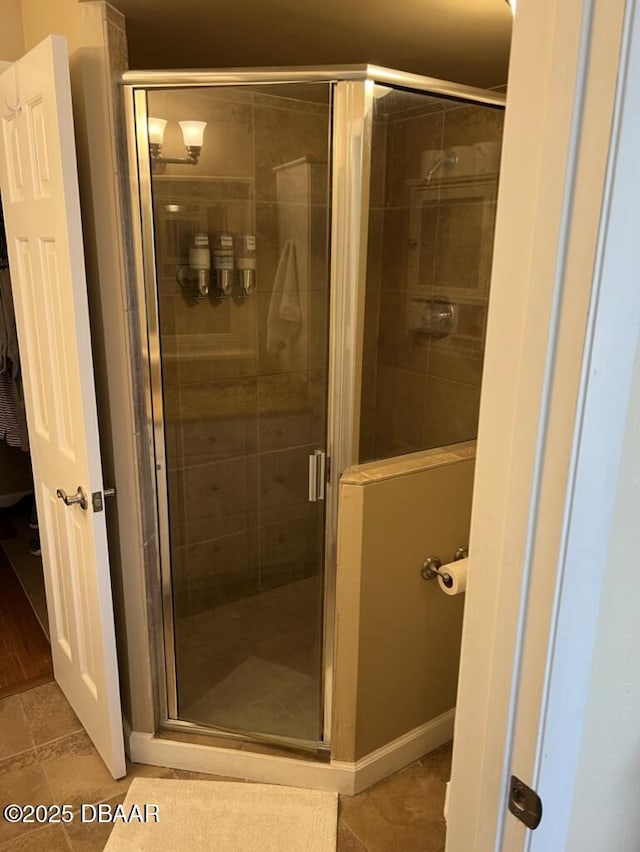 bathroom featuring a shower stall