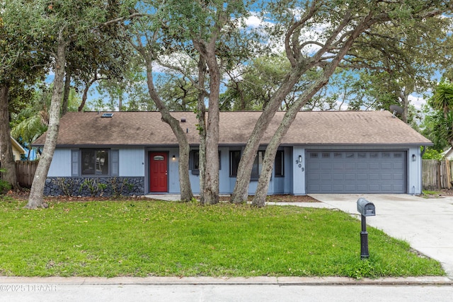 909 Brookside Dr, Ormond Beach, FL 32174 - view of front of house with a garage, concrete driveway, and roof with shingles