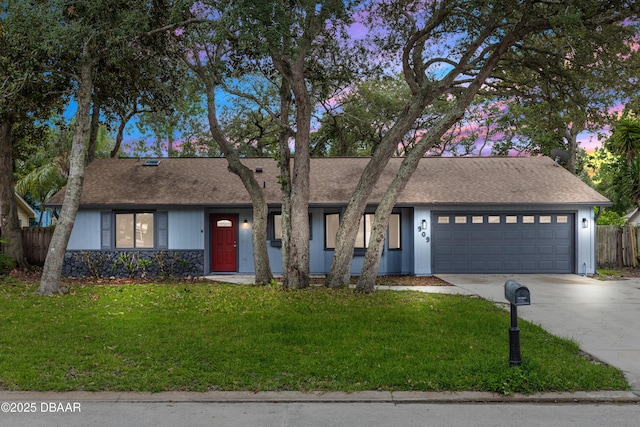 909 Brookside Dr, Ormond Beach, FL 32174 - view of front of property with an attached garage, concrete driveway, and roof with shingles