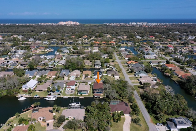 5 Chippeway Ct, Palm Coast, FL 32137 - aerial view of property and surrounding area featuring a large body of water and nearby suburban area