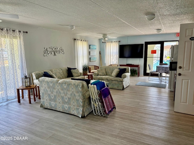 3800 S Atlantic Ave Unit 2010, Daytona Beach Shores, FL 32118 - living room with wood finished floors, plenty of natural light, and ceiling fan