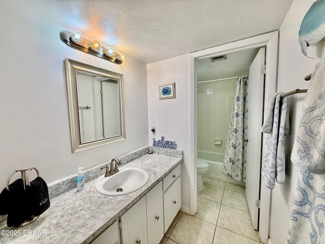 3800 S Atlantic Ave Unit 2010, Daytona Beach Shores, FL 32118 - full bath featuring tile patterned flooring, vanity, toilet, and shower / bath combo with shower curtain
