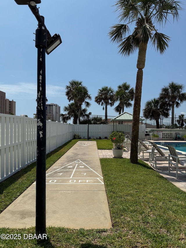 3800 S Atlantic Ave Unit 2010, Daytona Beach Shores, FL 32118 - view of property's community with shuffleboard and a swimming pool