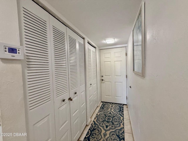 3800 S Atlantic Ave Unit 2010, Daytona Beach Shores, FL 32118 - corridor with light tile patterned flooring