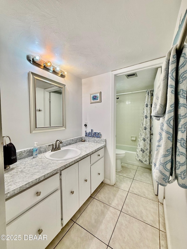 3800 S Atlantic Ave Unit 2010, Daytona Beach Shores, FL 32118 - full bathroom with vanity, tile patterned flooring, shower / tub combo, and toilet