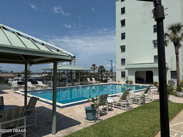 3800 S Atlantic Ave Unit 2010, Daytona Beach Shores, FL 32118 - community pool featuring a gazebo and a patio area